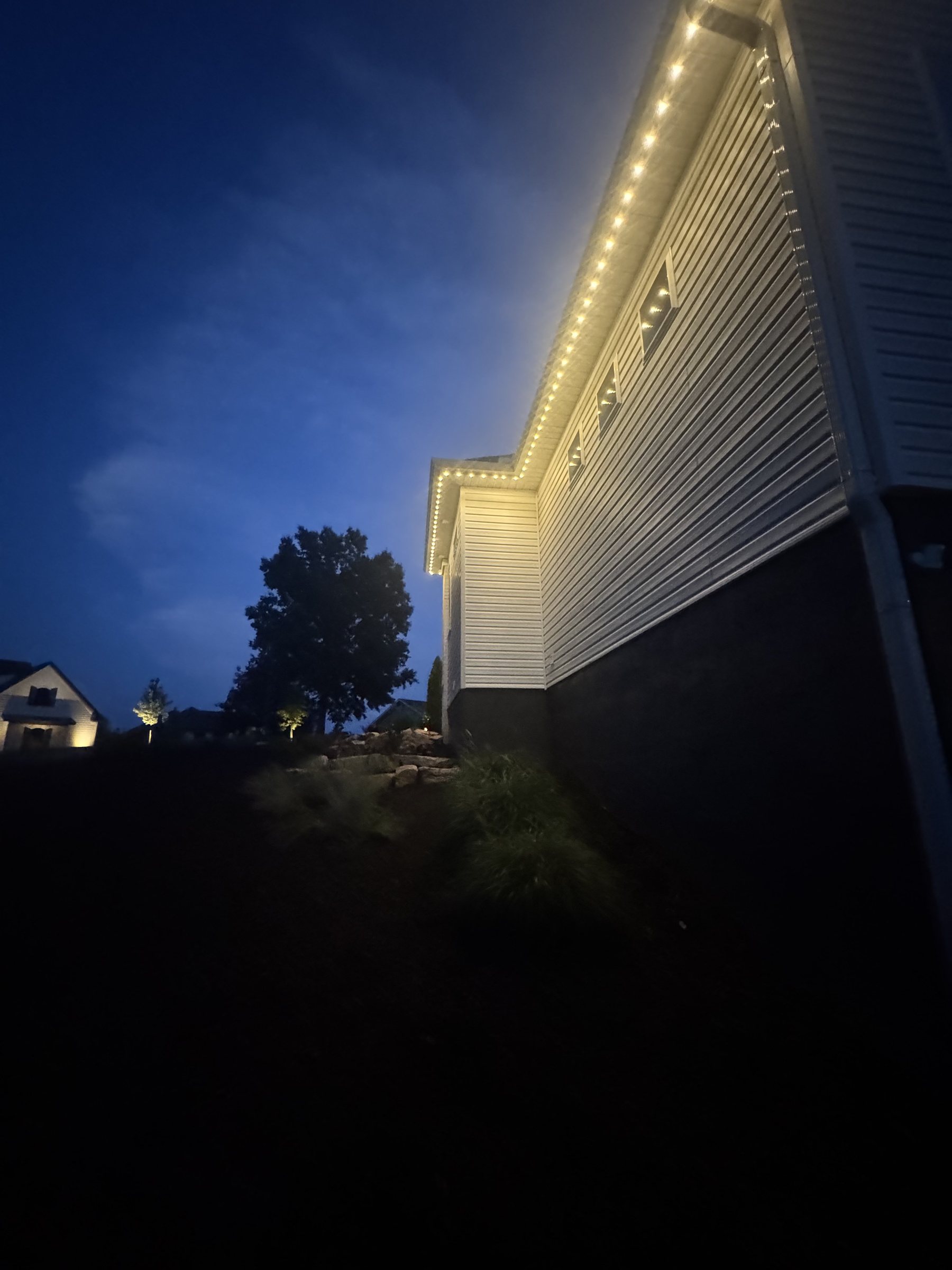Close detail of EverLume LED strip along roofline and siding